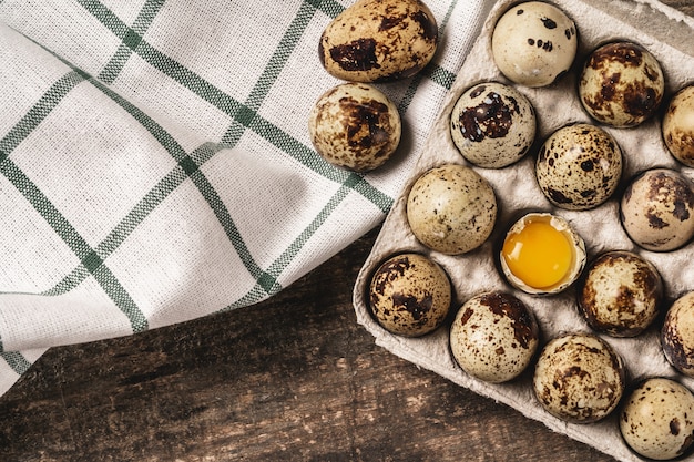 Quail eggs in cardboard box