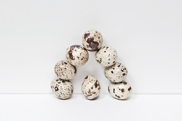 Quail eggs composition on white