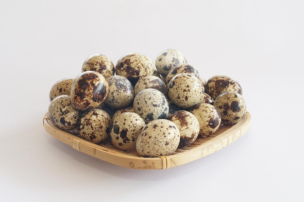 Quail eggs isolated on white background