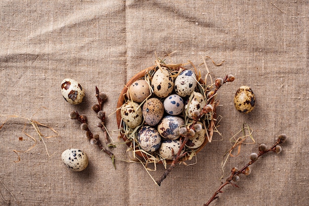 Quail eggs on linen background