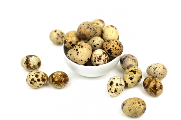 Quail eggs on a white background