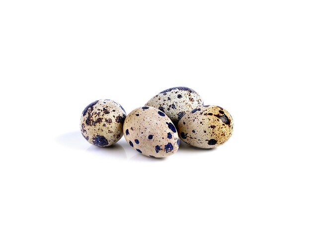 Quail eggs on white