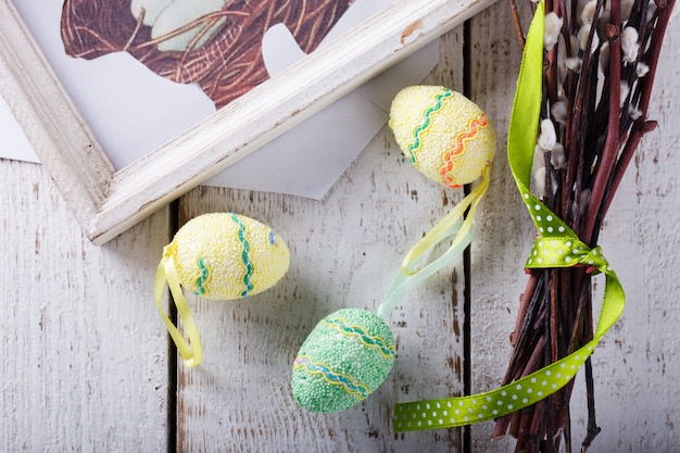 Quail eggs and willow, rabbit Easter symbol 