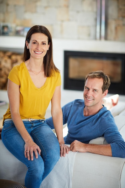 Quality time is important for us Portrait of a mature couple relaxing together at home