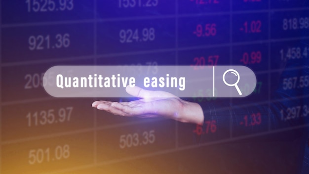 Quantitative easing written in search bar with the financial data visible on background Quantitative easing concept stock Market online marketing