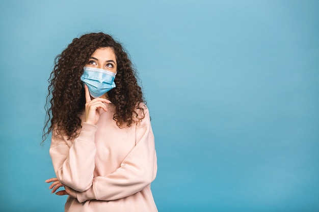 Quarantine concept. Close-up portrait of her she nice attractive lovable cute adorable winsome girl wear shirt protection flu cold facial mask