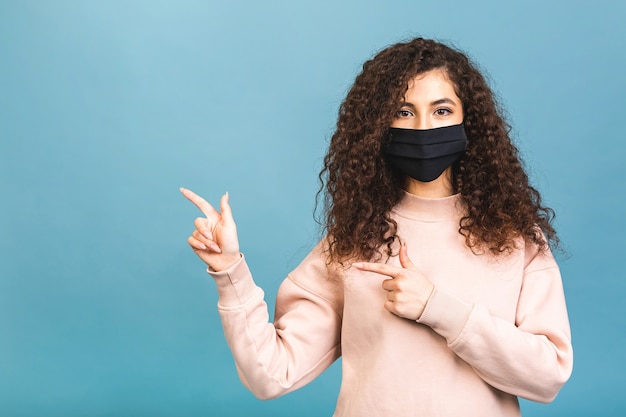 Quarantine concept. Close-up portrait of her she nice attractive lovable cute adorable winsome girl wear shirt protection flu cold facial mask