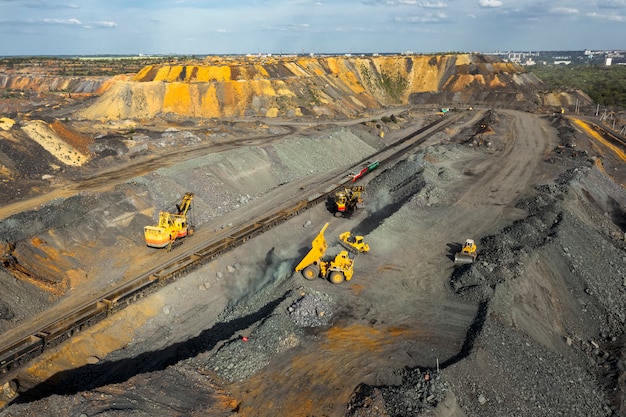 Quarry aggregate with heavy duty machinery.