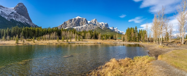 Quarry Lake park. Snow capped Mount Rundle and Mount Lawrence Grassi Ha Ling Peak