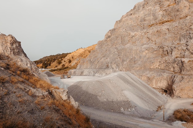 Quarry machines and piles of gravel over blue sky stone
crushing and screening plant high quality