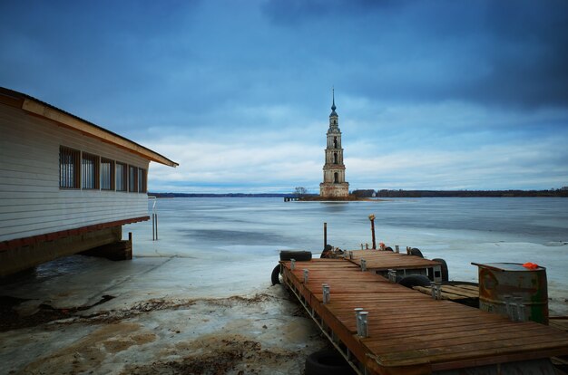 Quay near the bell tower architecture background