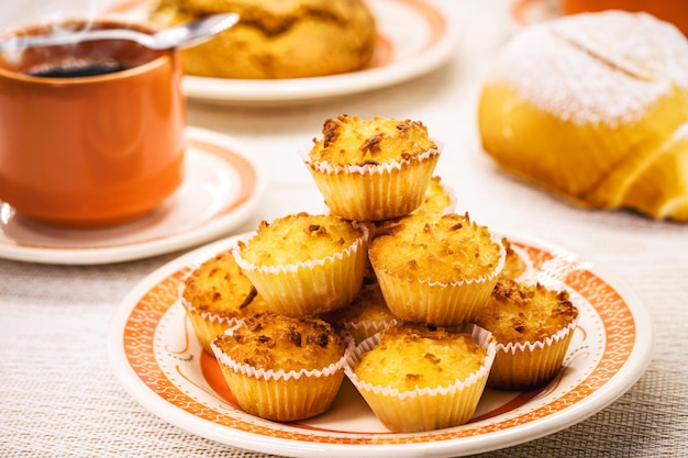 Queijadinha or queijada sweet baked dessert from a traditional bakery and pastry shop from Brazil and Portugal made with eggs cheese or coconut and lots of sugar