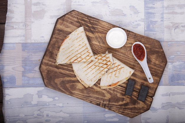 quesadilla on a wooden background