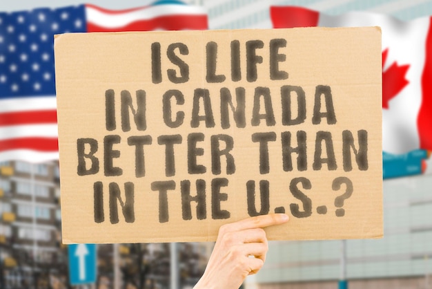 The question is life in canada better than the us is on a
banner in men's hands with blurred background budget system cheap
low easy saving political peace power unity proud fiscal