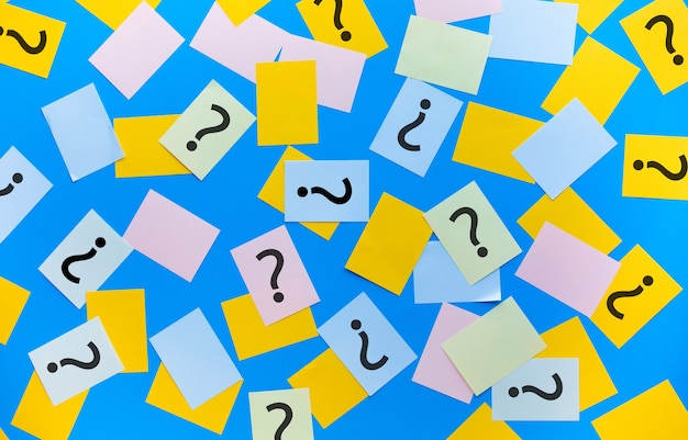 Question mark answer concepts with sign on colorful notepaper