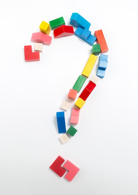 Question mark made of cubes blocks on a white background.