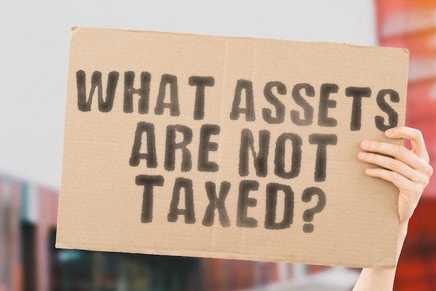 The question What assets are not taxed on a banner in men's hands with blurred background Banking Data Financial Invest Economy Value Advice Office Cost Document Currency Control