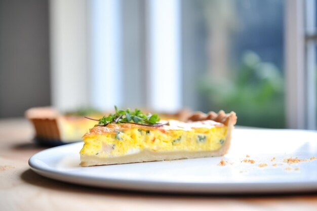 Quiche with golden cheese spots viewed from the side