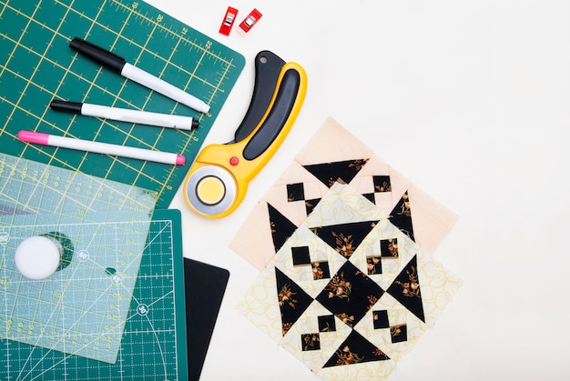 Quilting tools on white background