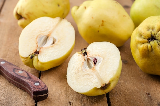 Quince on a dark wooden background.