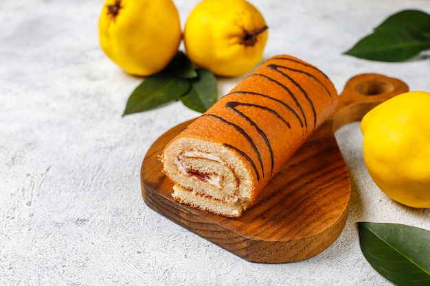 Quince jam cake roll with fresh organic quinces