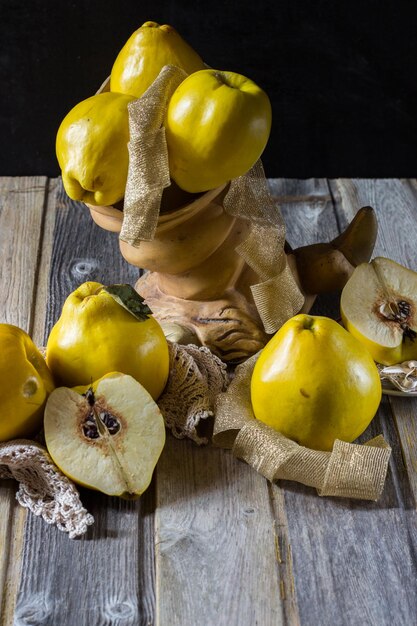 Quince on wooden background selective focus