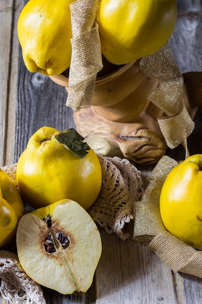 Photo quince on wooden background selective focus