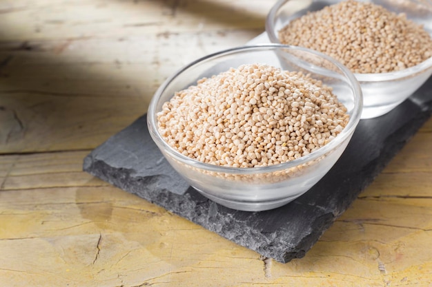 Quinoa beans in bowl on rustic wood