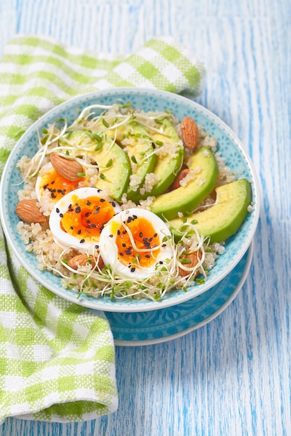 Quinoa bowl with egg and avocado for healthy breakfast