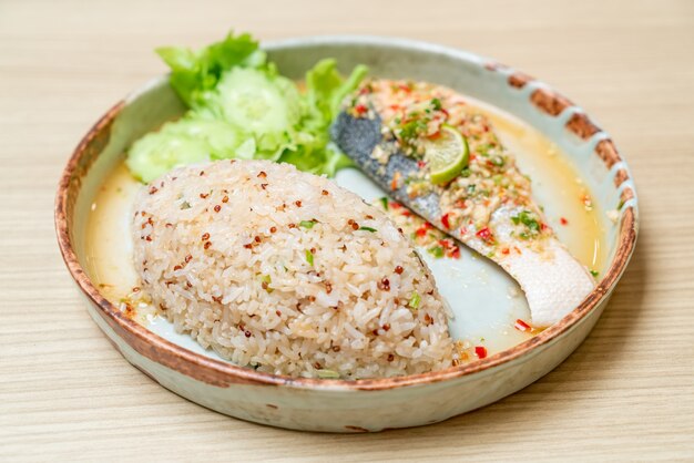 quinoa fried rice with steamed salmon in lime chilli dressing