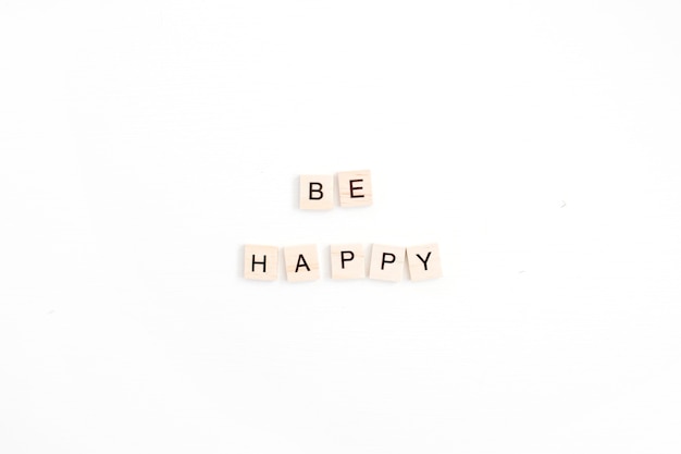 Quote Be Happy with wooden tiles on white