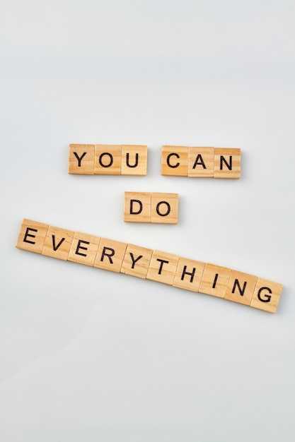 Quote for belief in yourself. Self-confidence concept made from wooden letter blocks on white background.