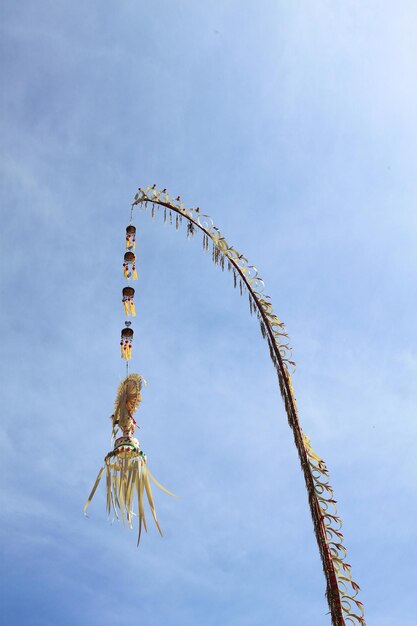 Photo quotpenjorquot tall and curved bamboo stick decorated with specially shaped young coconut leaves