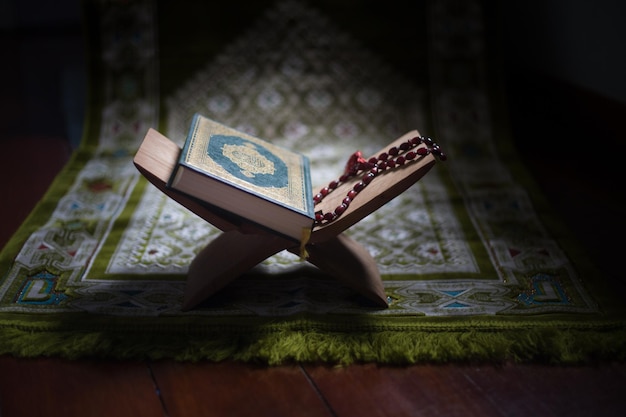 quran holy book of muslims around the world put on wooden boards