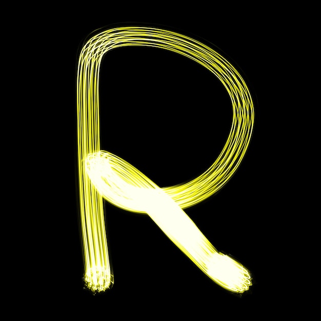 R Created by light alphabet over black background