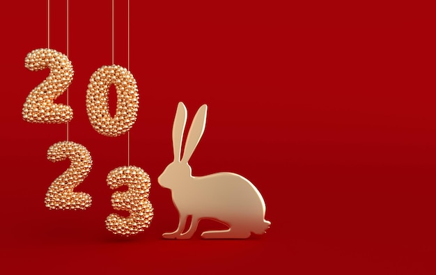 Photo rabbit zodiac sign and 2023 numerals on red background asian golden rabbit chinese new year 2023