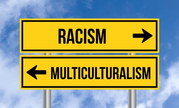 Racism or multiculturalism road sign on cloudy sky background