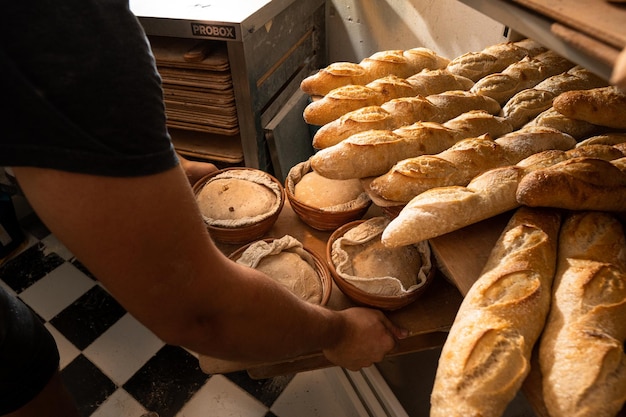 Rack with freshly baked bread in a small bakery