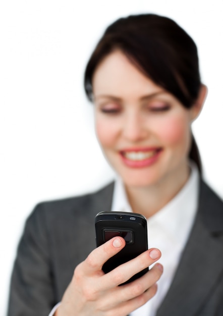 Radiant businesswoman holding a phone 