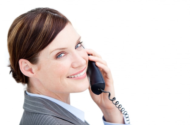 Radiant businesswoman talking on phone 