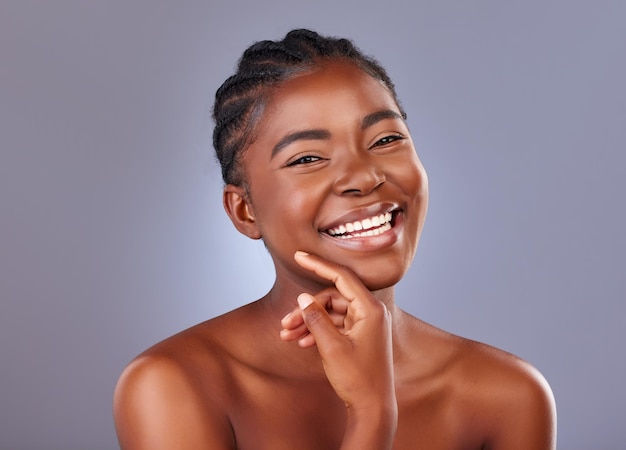 Radiant skin is a dream. Shot of a beautiful young woman posing against a studio background.