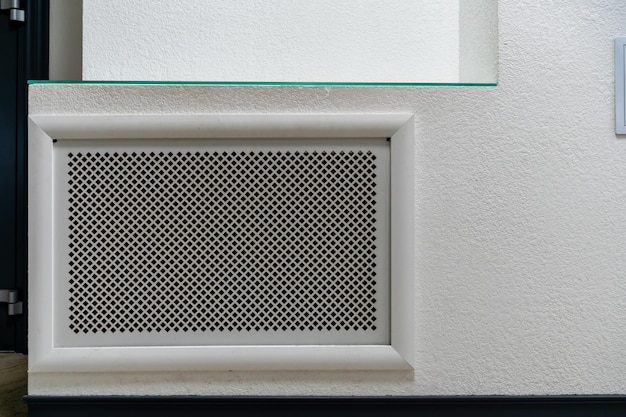 Radiator grille of a large industrial air purifier Indoor air purification and filtration system Ventilation in an office building Working air conditioning in the hotel