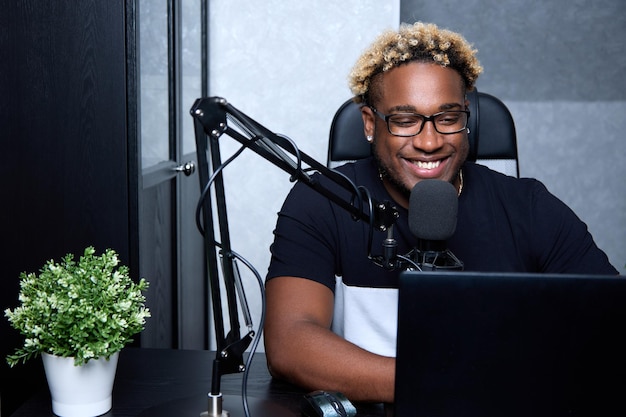 Radio dj with glasses leads a popular program for listeners