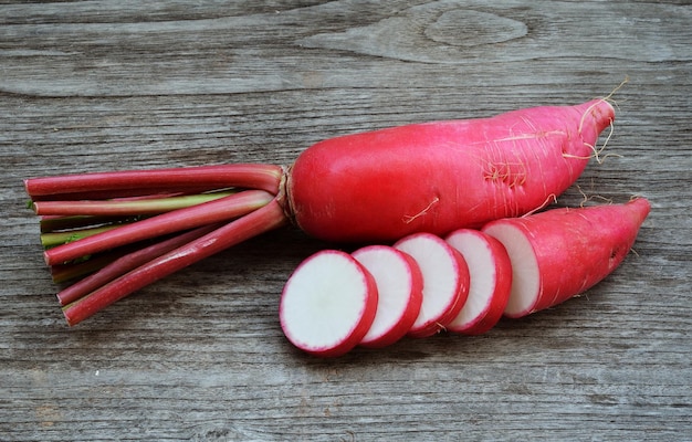 Radish on wooden background