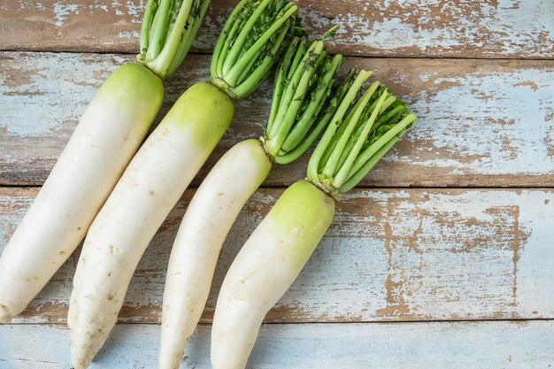 Radish on a wooden background