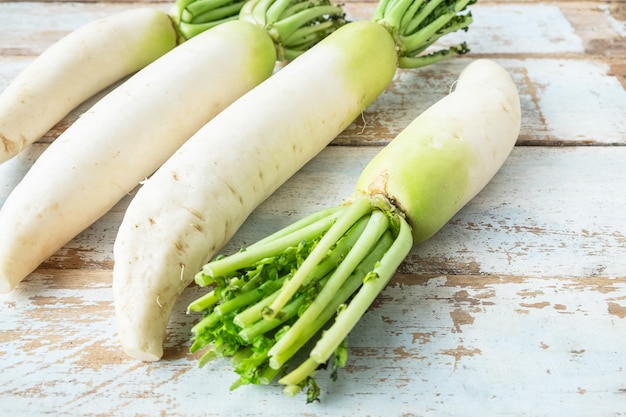 Radish on a wooden background