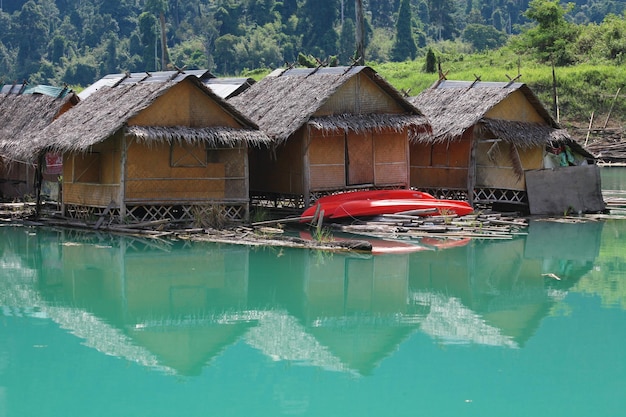 Raft house with water reflection