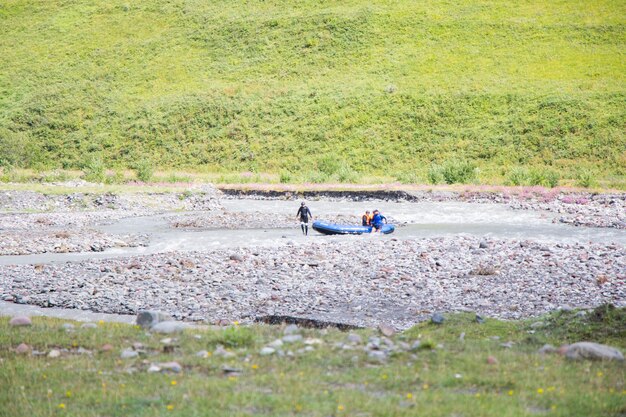 Rafting and river landscape and view in Juta, Georgia. People in boat.