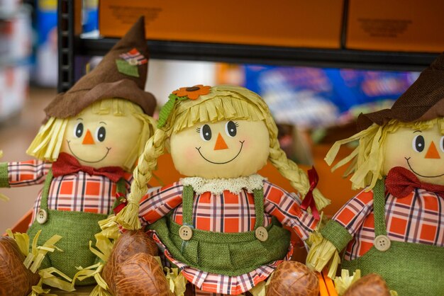 Rag dolls in the form of scarecrows Sale of decorative objects of autumn season