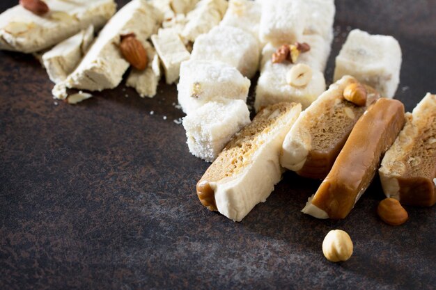 Rahat Lukum, sherbet and halva on the kitchen table. Turkish and Arabic sweets. Ramadan food.